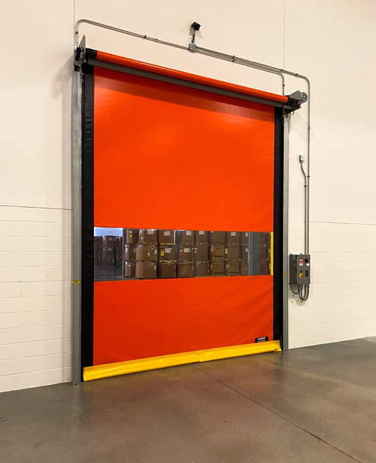 Orange high speed doors with a yellow bottom seal on door