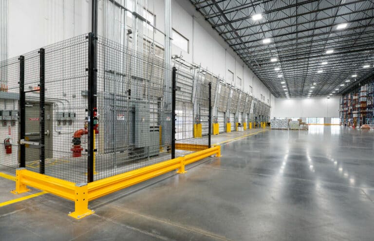 Wire mesh security cage inside modern warehouse